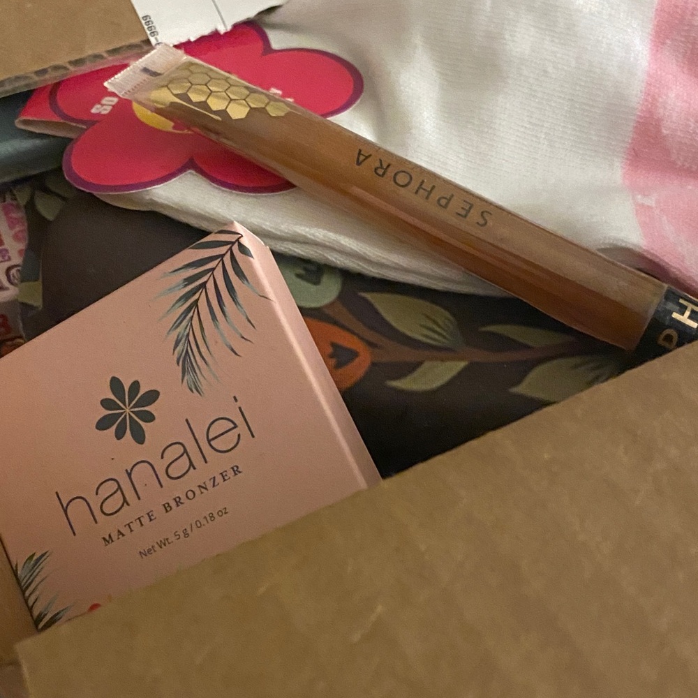 Mixed Mystery box Sephora Lip Gloss and Hanalei Bronzer are just hints